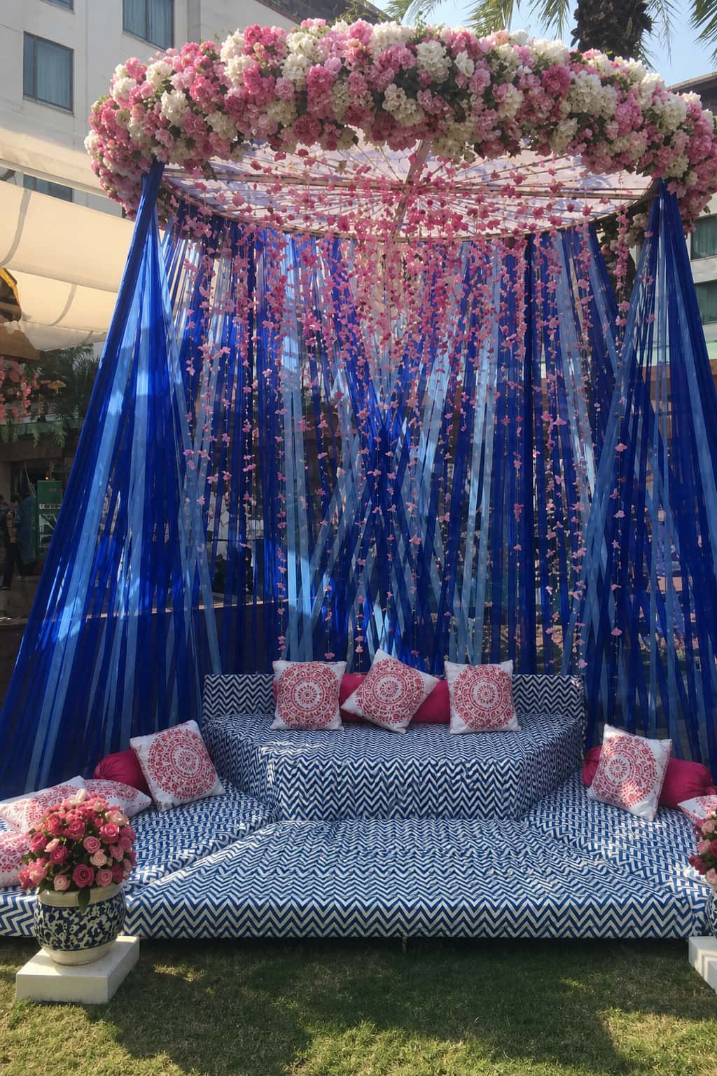 Wedding and social event styling by RKPRODXN — mandap florals at dusk · 2
