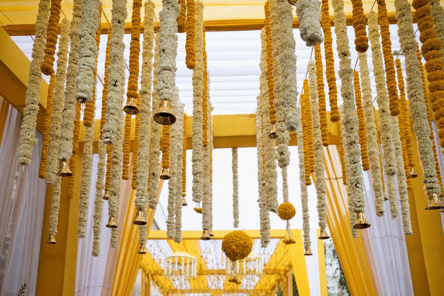 Wedding and social event styling by RKPRODXN — garland-lined entrance · 4